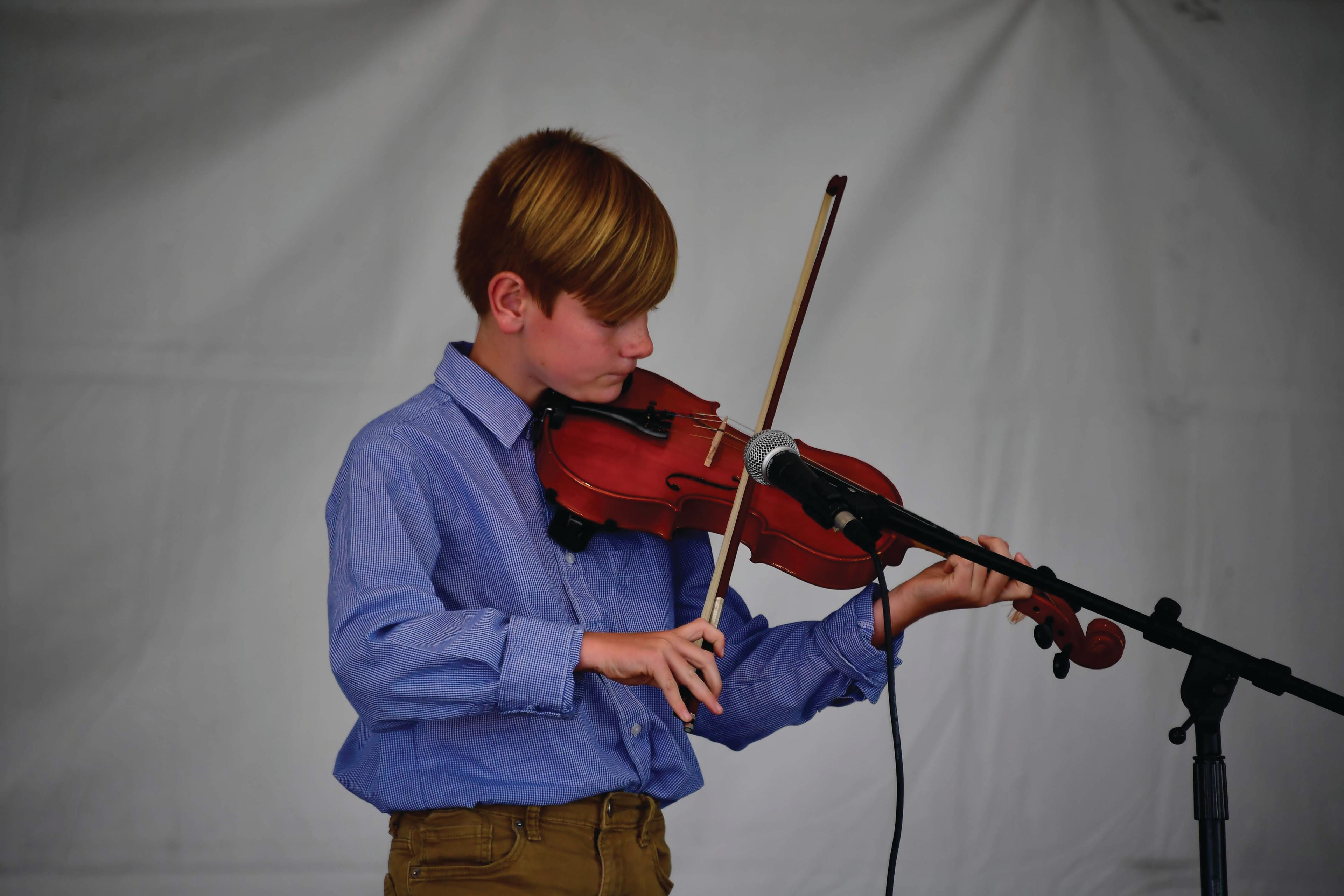boy playing violin