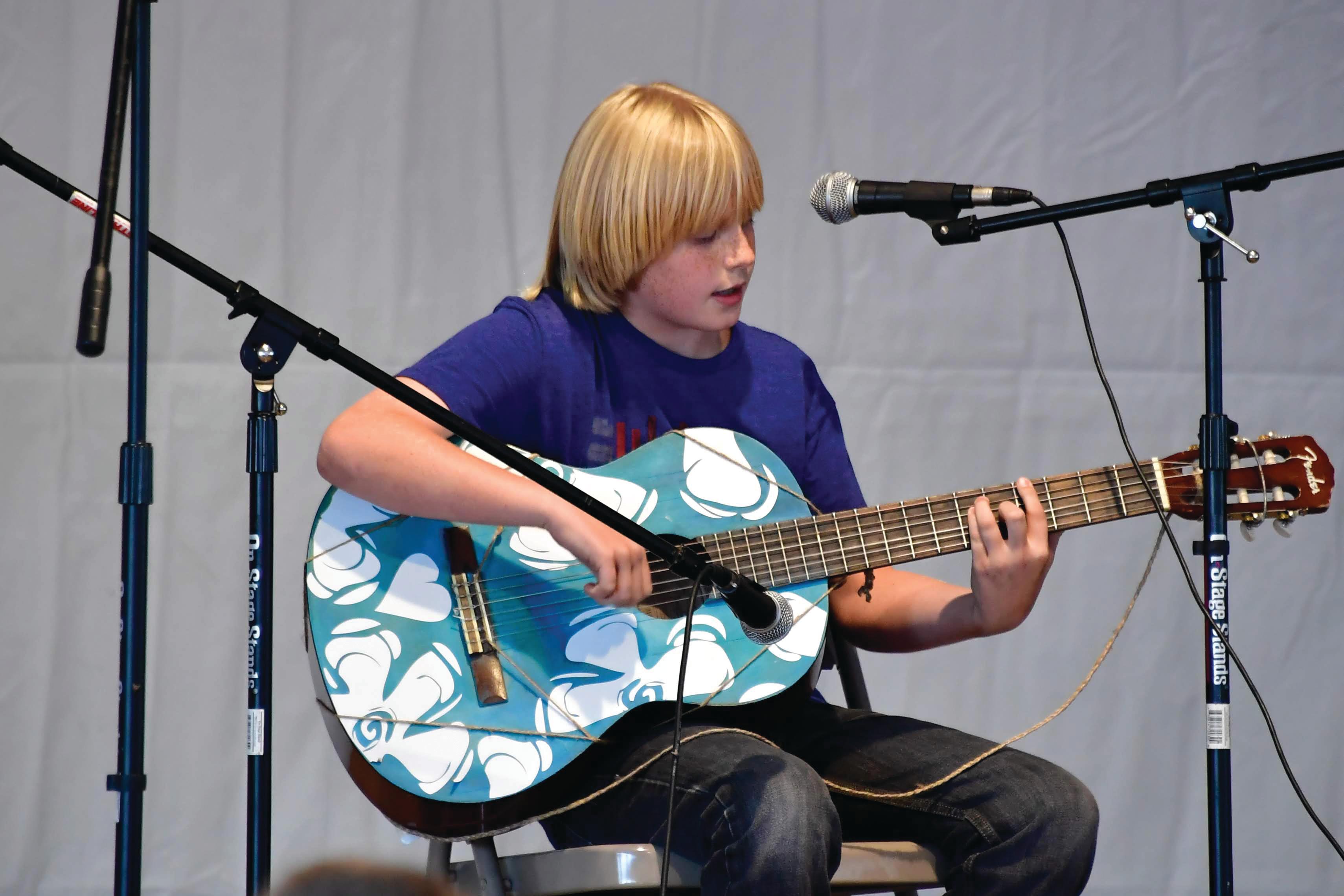 Boy playing guitar