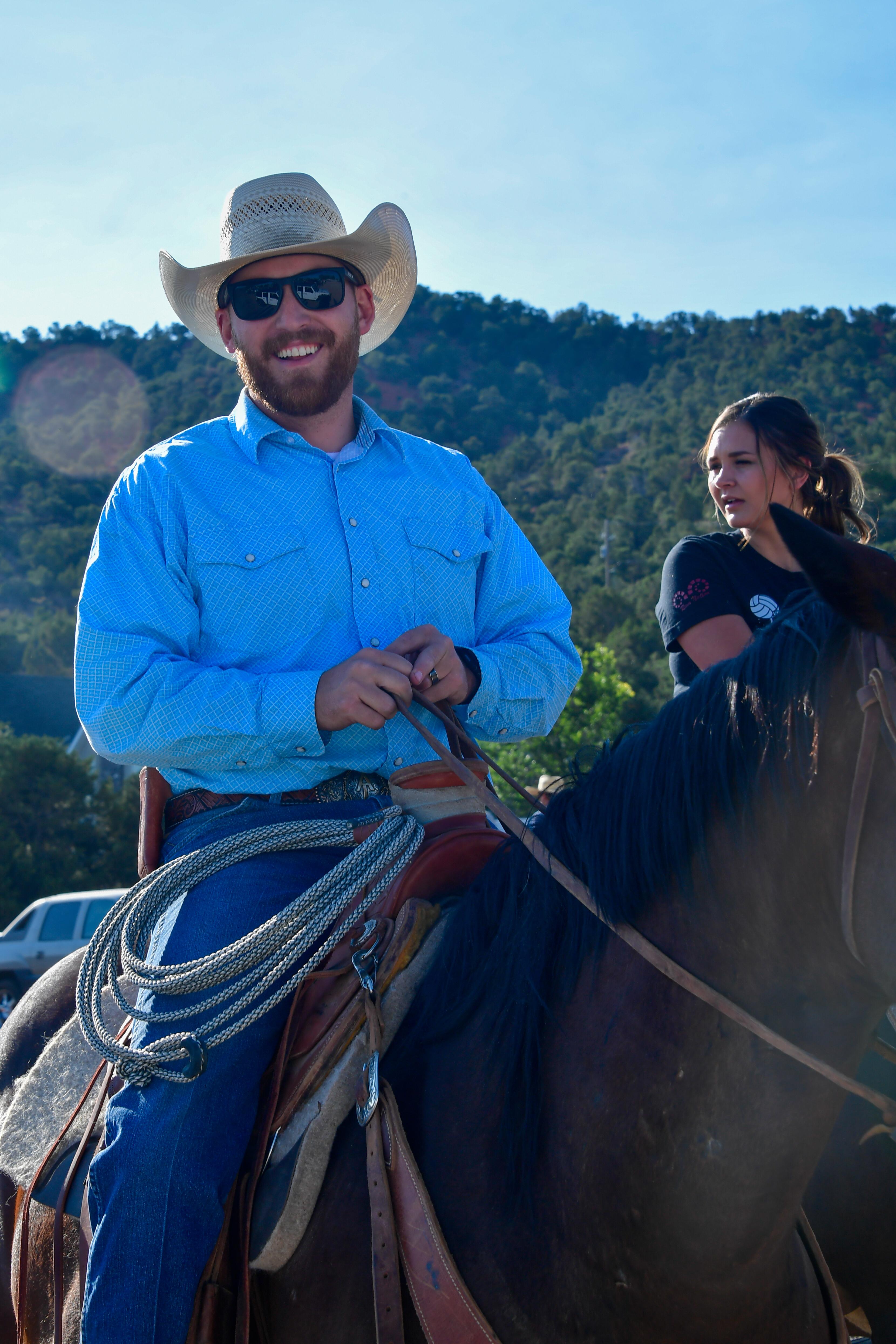 man riding horse